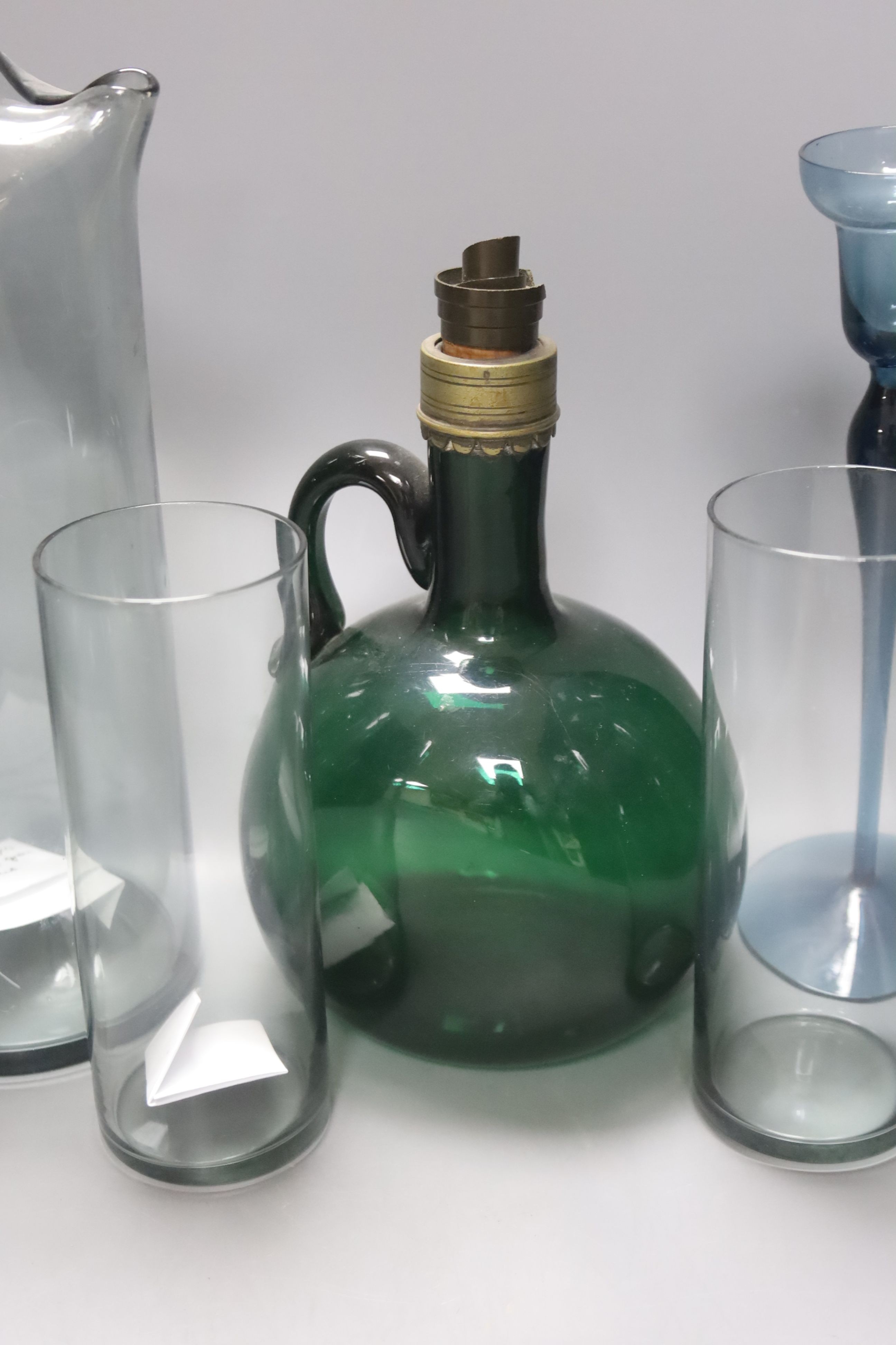 Two 19th century green glass hock jugs, a set of six Waterford cut glass tumblers and other glassware